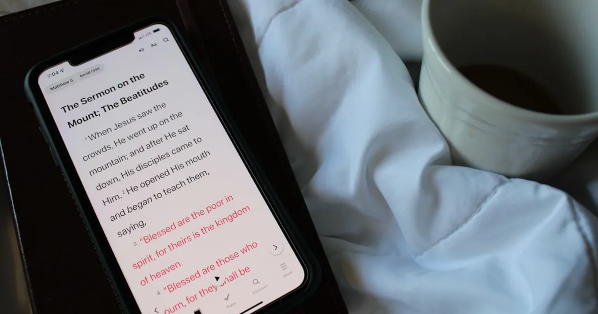 a cell phone on a bed