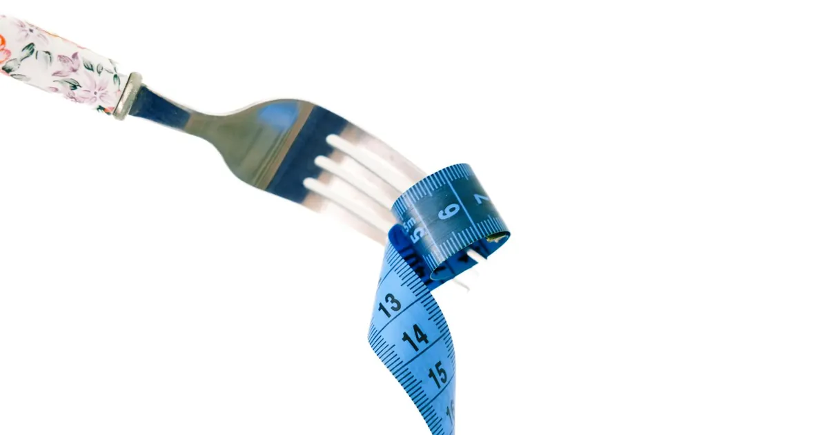 A fork twirls a blue measuring tape, symbolizing weight management and health.