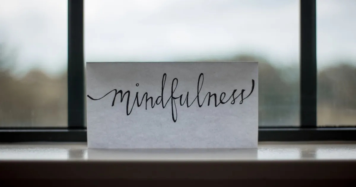 mindfulness printed paper near window mindfulness printed paper near window